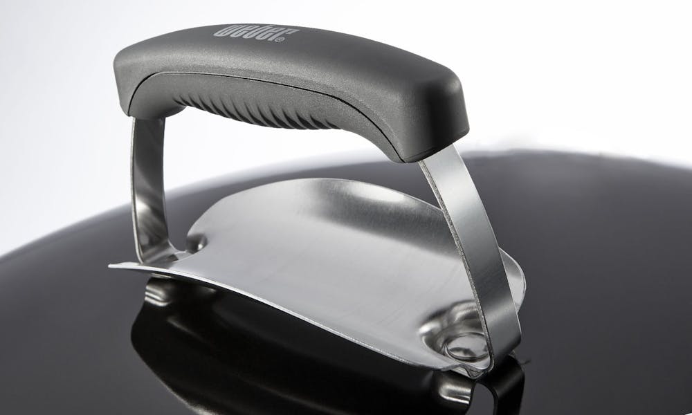 Lid handle with heat shield